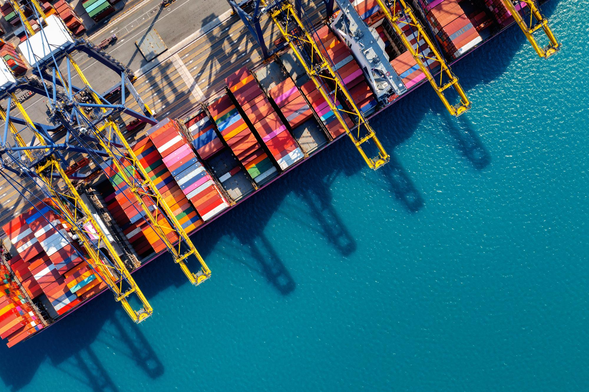 aerial-view-of-cargo-ship-and-cargo-container-in-harbor (1)